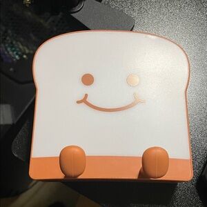 Cute Smiling Bread-Shaped Night Light Toaster Phone Holder